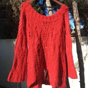 Red sweater with a hint of violet colored red
